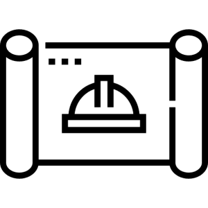 A small dog with light brown fur stands on a sandy beach, looking toward the ocean. The sky is clear and blue, and gentle waves are visible in the background.